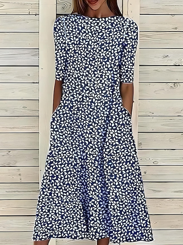 Mirielle | Midi-sommarklänning med kustblommor och rund hals
