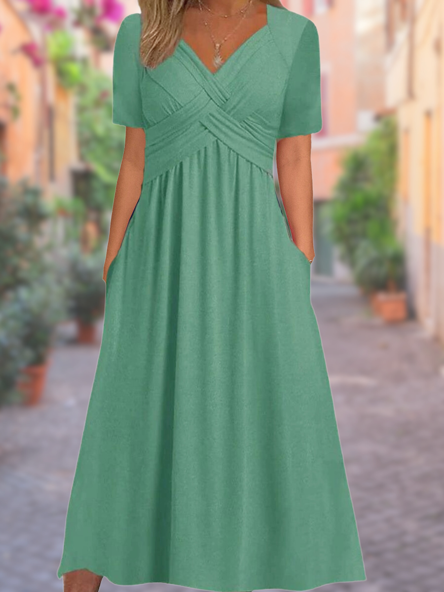 Tindra – Elegant omlottklänning
