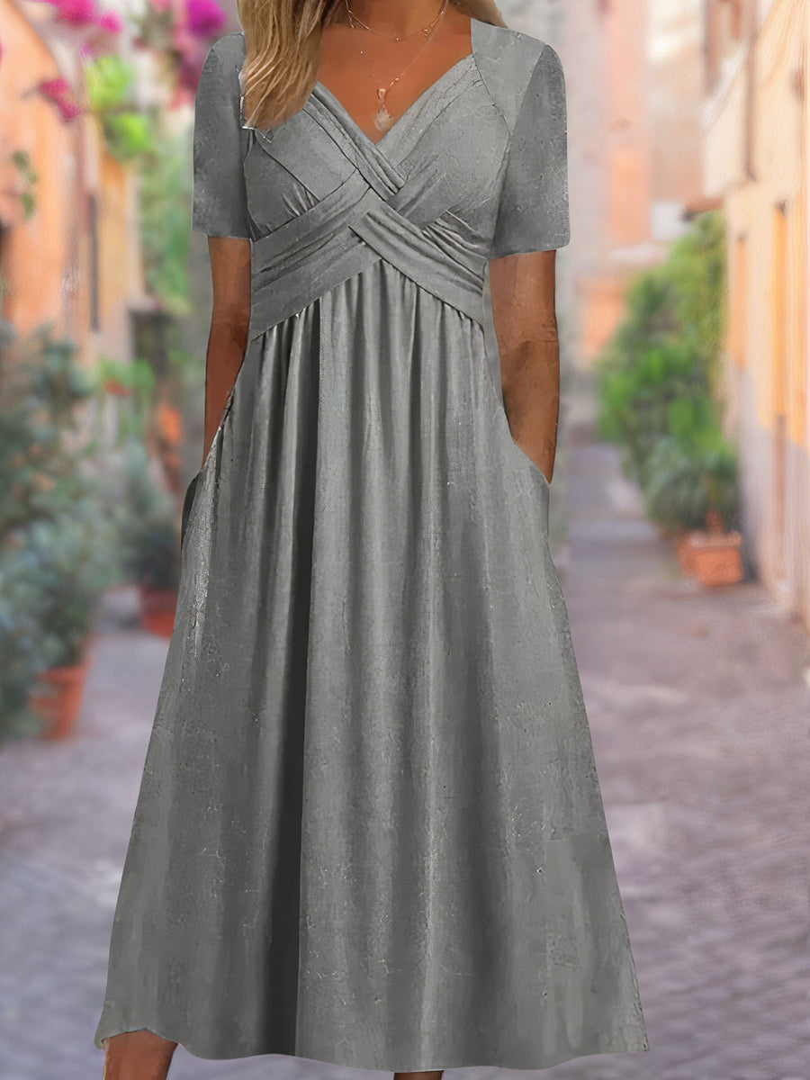 Tindra – Elegant omlottklänning