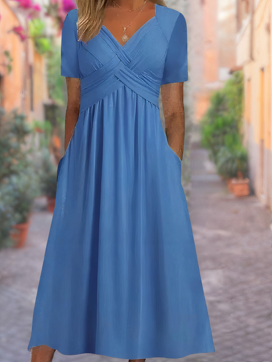 Tindra – Elegant omlottklänning